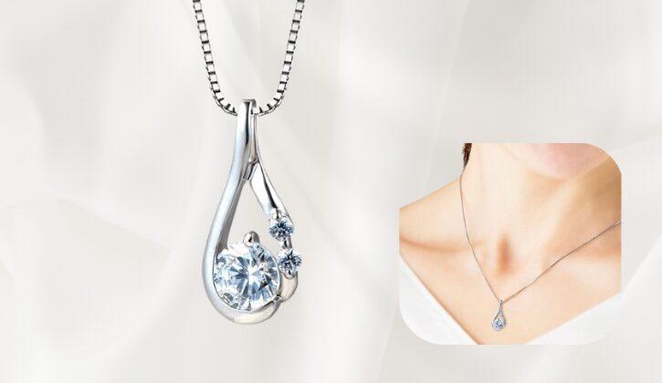 ダイヤモンドペンダント 曲線で女性らしいデザイン メレダイヤ2個